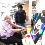 Thembalami-resident-Sarah-Richards-with-occupational-therapy-assistant-Shirley-Sibeko.
