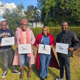 Rand Aid employees Philani Khumalo, Sharon Dlamini, Hlumela Anderson and Lucas Tshikonwane with their certificates.