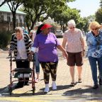 Thembalami resident Elizabeth Andrews with Nellie Dlamini and Thornhill Manor residents Joan Wilkins and Sigrid Hudson.