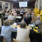 Eyes on the prize! With the trivia quiz on the big screen, the competition is underway.